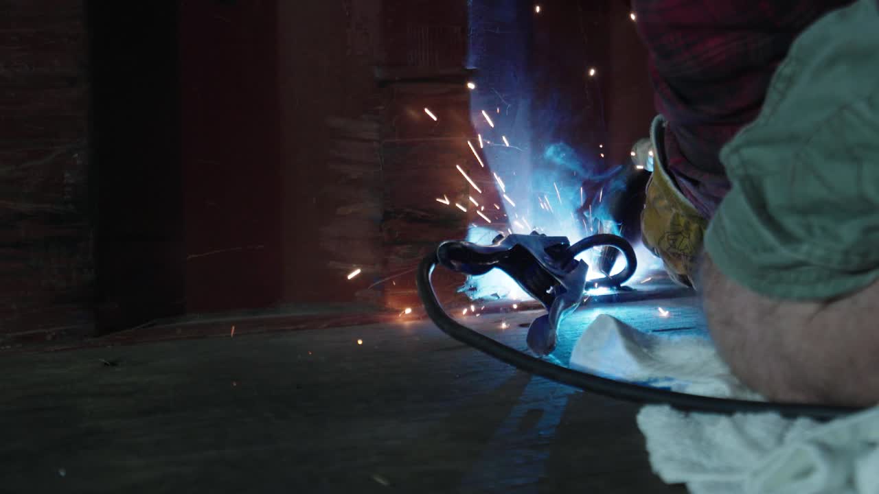 Welding in a Truck Trailer Dolly Shot