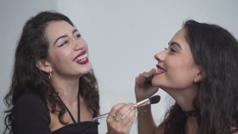 friends getting ready with makeup