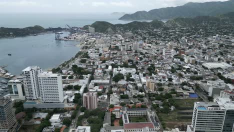 Aerial-Drone-Cityscape-of-Santa-Marta-Colombia-Rodadero-Beach-Resort-Town-Travel-and-Tourism-Caribbean-Sea-Destination-around-Tropical-Hills