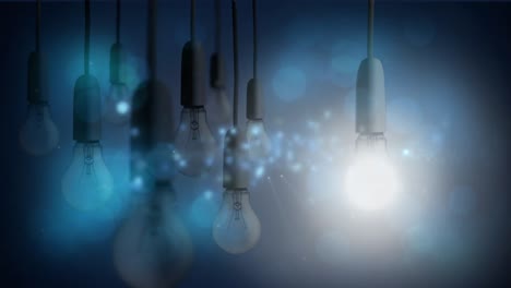 animation of light bulbs with glowing flicekring spots and copy space