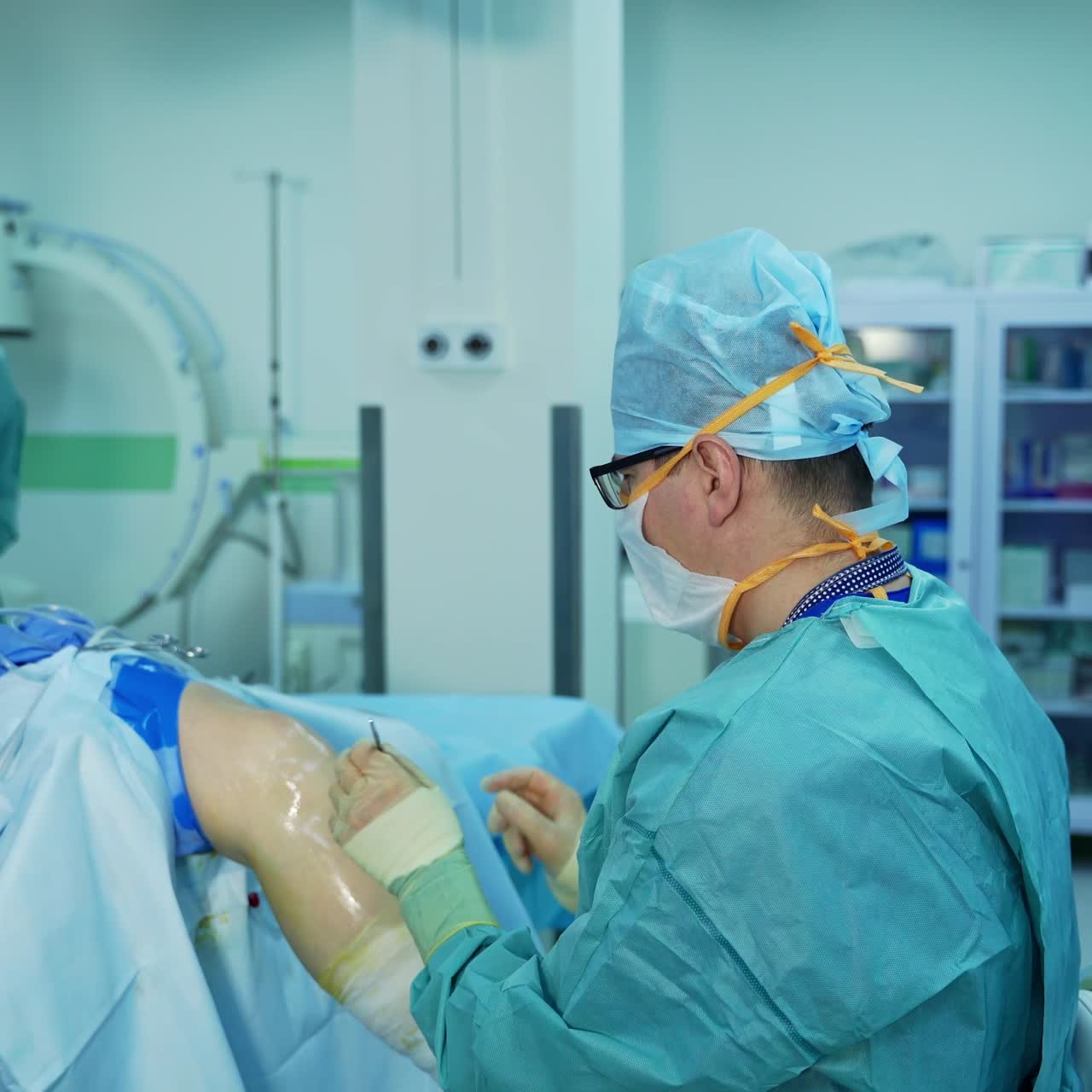 Medical team helping patient. Group of surgeon is working in operating theatre