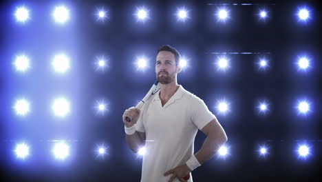 young man standing with the racket