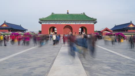 timelapse of the people wander in the temple of heaven at weekend, beijing.