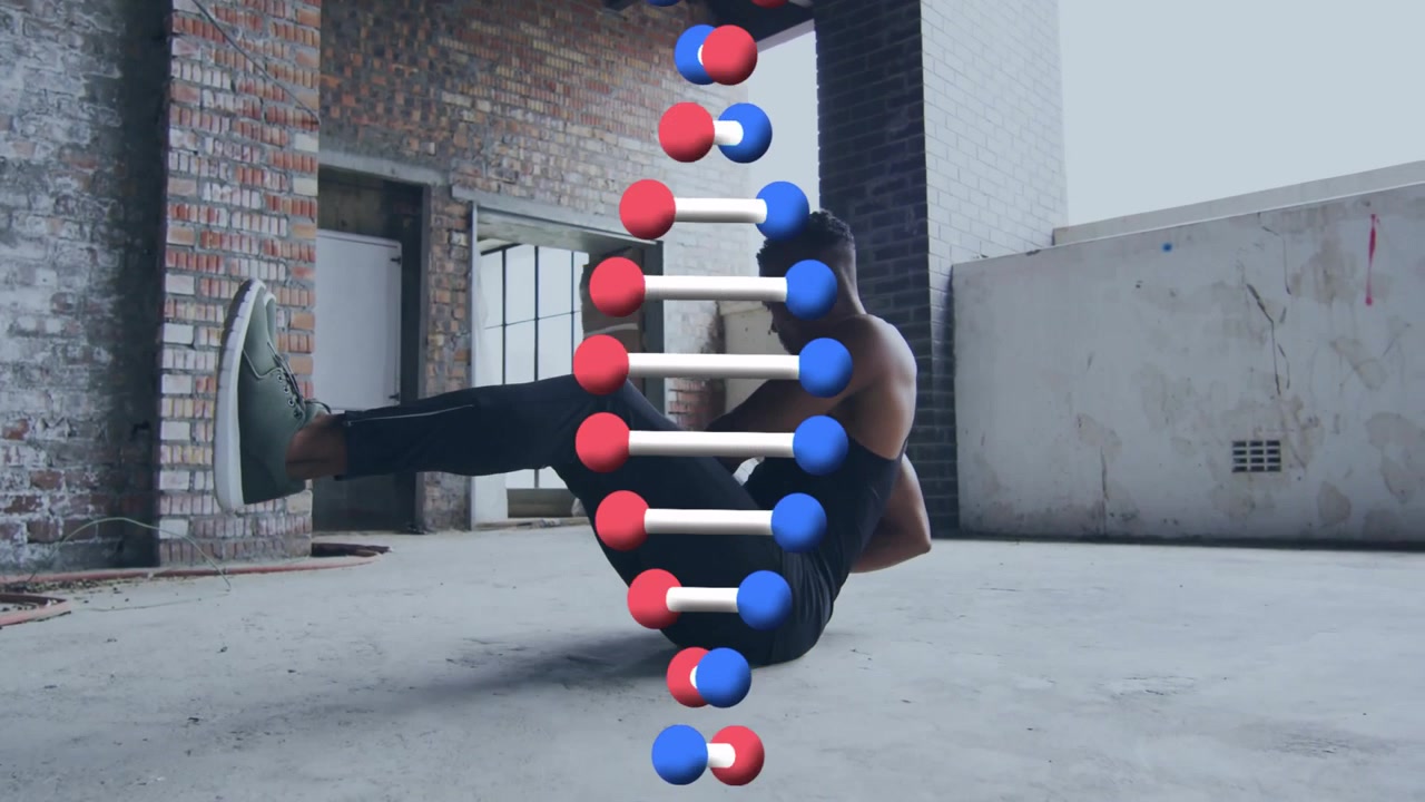 Persona realizando un movimiento de breakdance, con una superposición de animación de cadena de ADN en el fondo