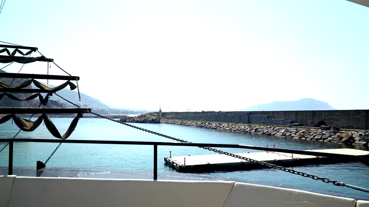 a ship in port. pier view