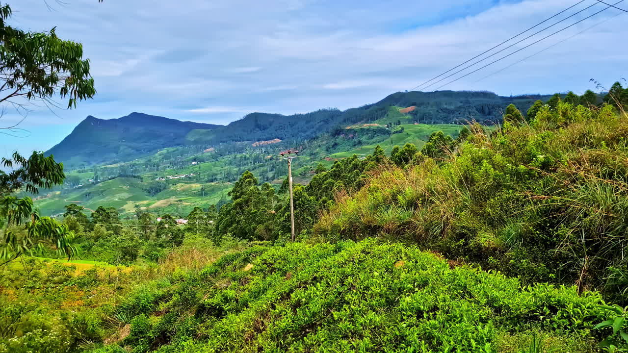 Scenic blue train ride journey POV winding through Sri Lankan mountains from Ella to Kandy