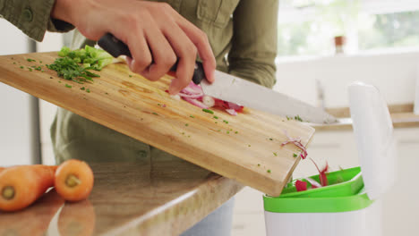 video of hands of biracial woman preparing meal