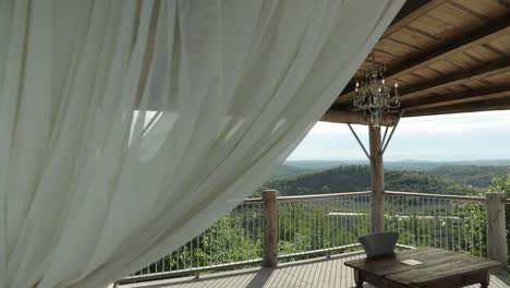 gorgeous outdoor wedding altar with a spectacular view of the gatineau hills at the le belvédère events center in wakefield, quebec