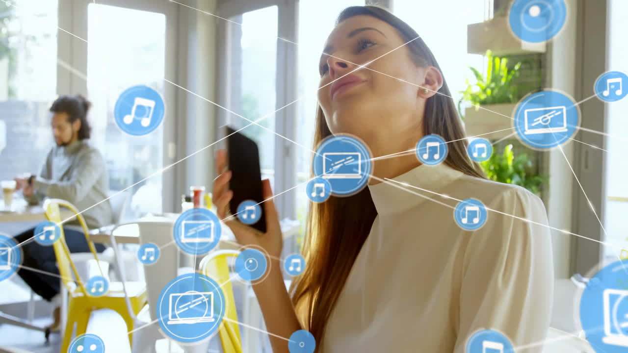 Digital connectivity and music icons animation over people in bright cafe