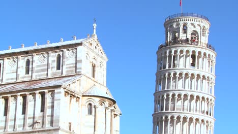 close up of the basilica and leaning tower of pisa