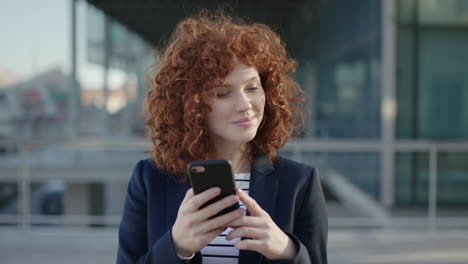 stylish-young-woman-portrait-corporate-student-texting-on-phone-waiting-on-college-university-campus