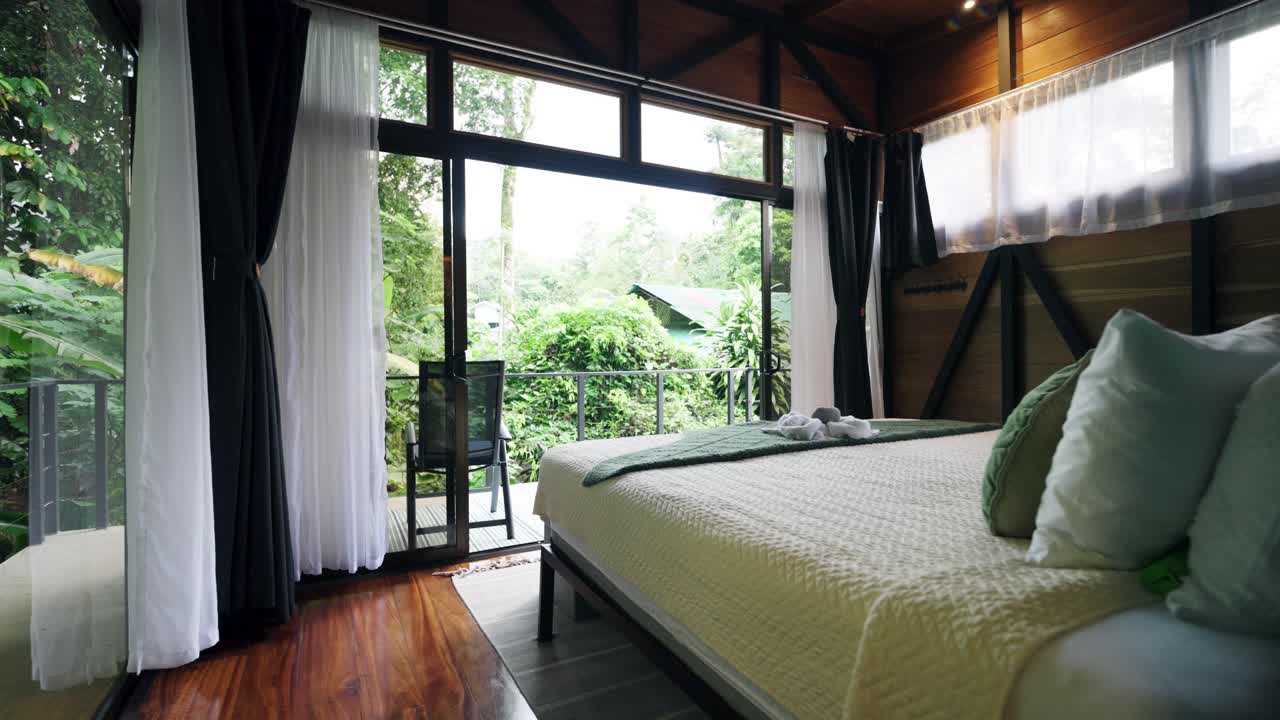 Bedroom with Balcony View