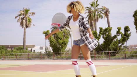 Woman-in-roller-skates-on-basketball-court