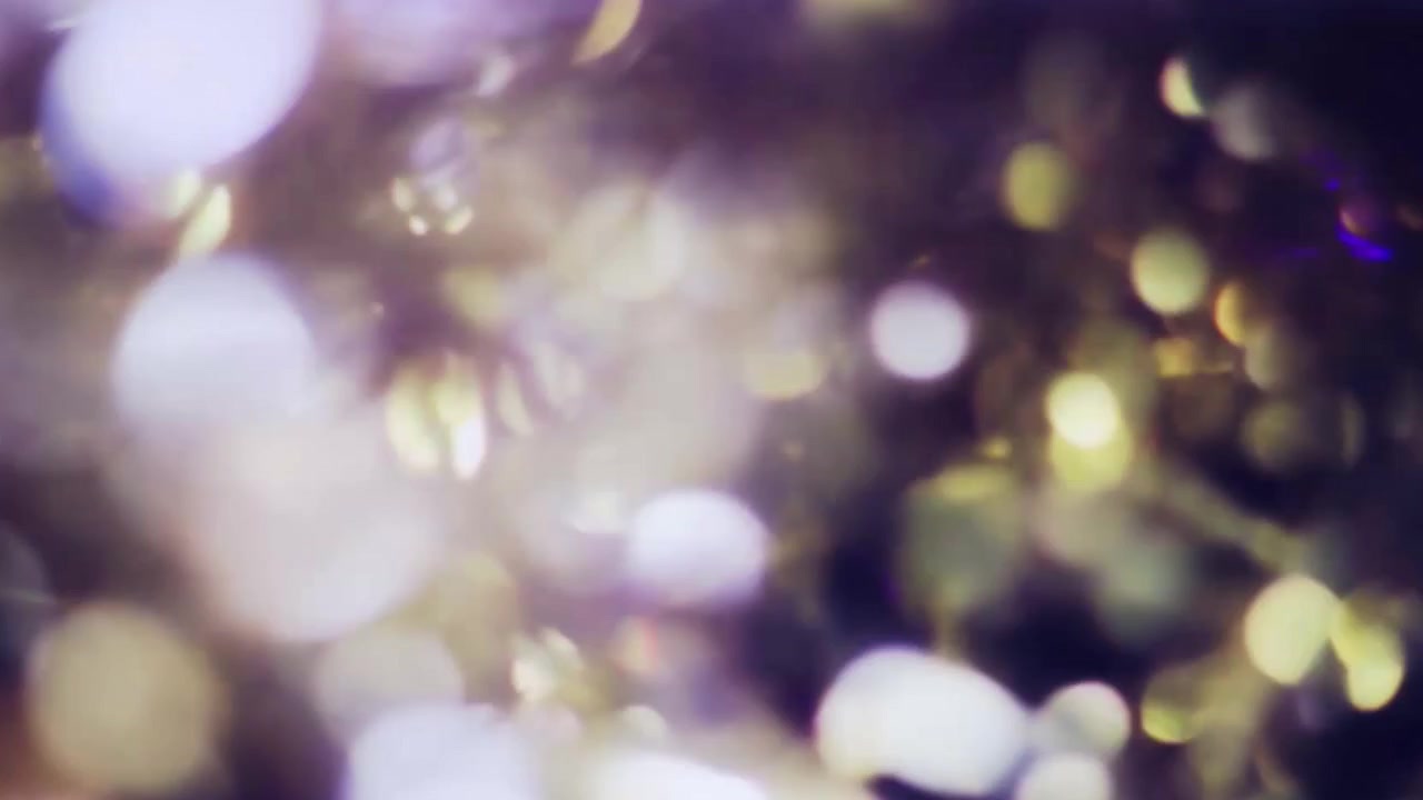 Sfondo Astratto con Bokeh di Luci Colorate Scintillanti