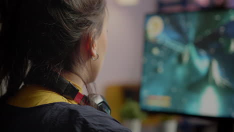 Closeup-portrait-of-pro-woman-gamer-looking-at-camera-smiling