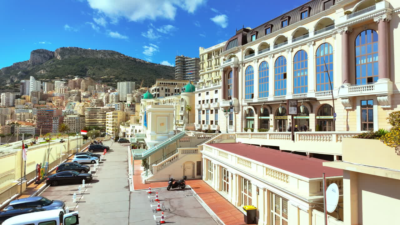 Street in MonteCarlo with the skyline of Monaco on the background