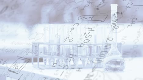 chemical structures and equations floating over chemistry equipment in school laboratory