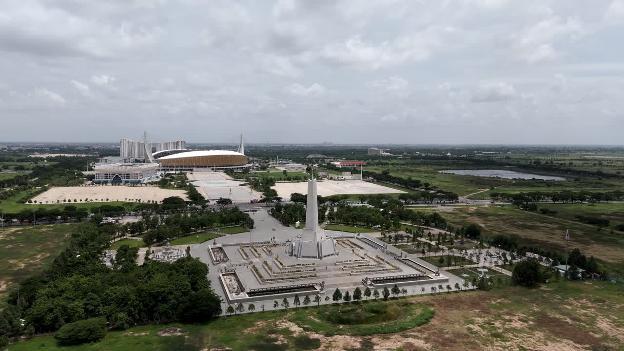 Aerial footage above the Win Win memorial monument, Phnom Penh, Cambodia. Drone spin around the compound from right to left showing also in the background Morodok stadium