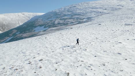 long distance runner in the mountains on a sunny day