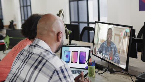 African-american-business-people-on-video-call-with-african-american-male-colleague-on-screen