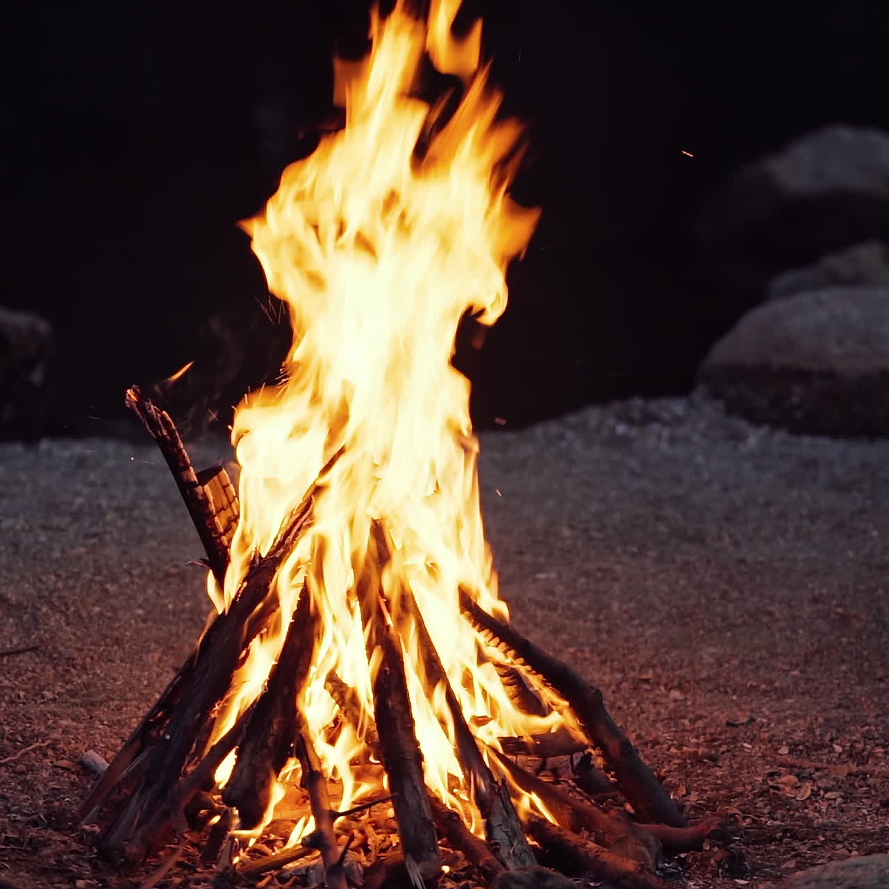 Close up of campfire burning in slow motion.