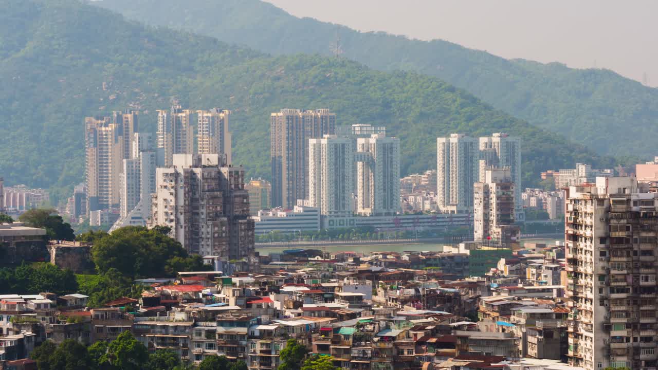 china macao ciudad isla día luz edificios de apartamentos techo panorama 4k lapso de tiempo