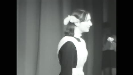 a young pioneers standing in stage. circa ussr 1970: a young pioneers standing in stage