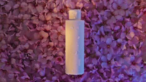 white packaging on a pink flowers bed background with water wave effect, underwater at sunset golden hour