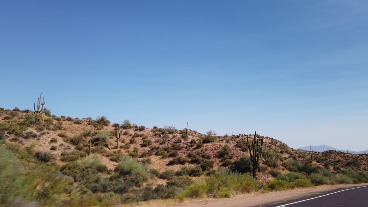 Driving through the Sonoran Desert landscape in the dead of summer.