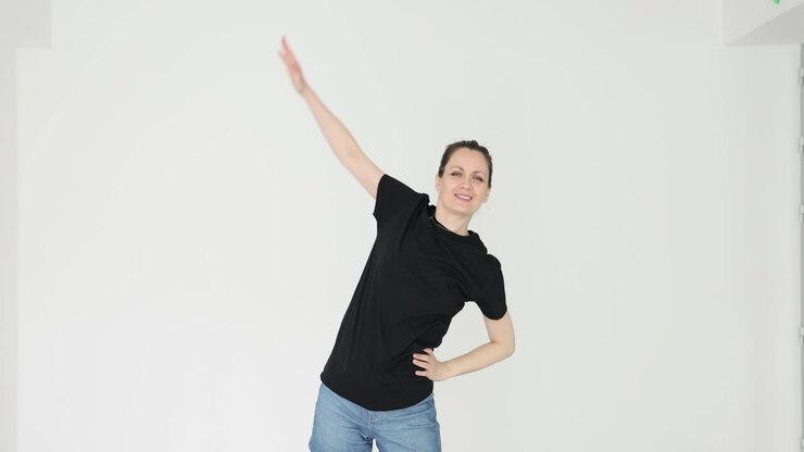 Woman performing a side bend stretching exercise