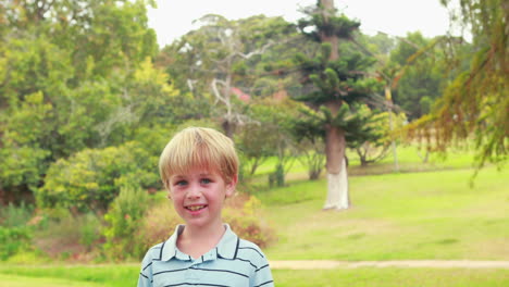 happy little boy looking at camera