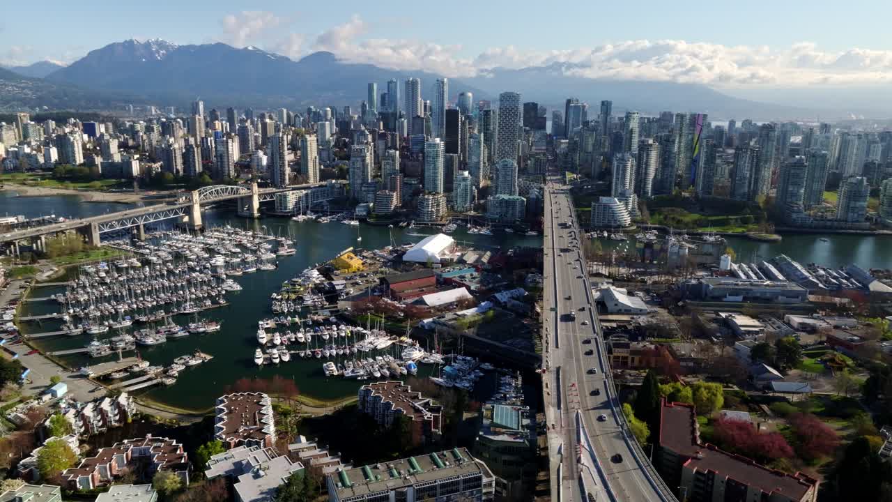 An Elevated View From South Granville Captures Vancouver’s Dynamic Skyline, Busy Marina, and the Scenic Mountains Beyond in Vancouver, British Columbia, Canada - Wide Shot