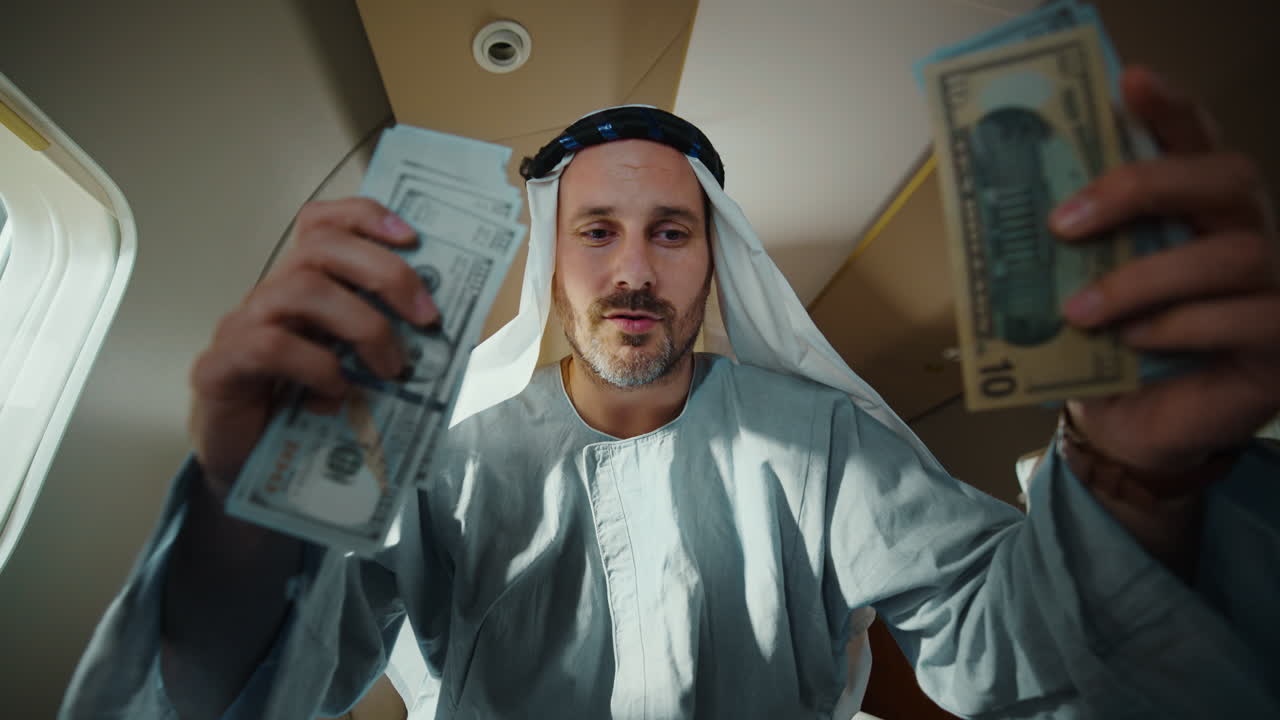 Arabian Sheikh shows off his wealth on a private jet