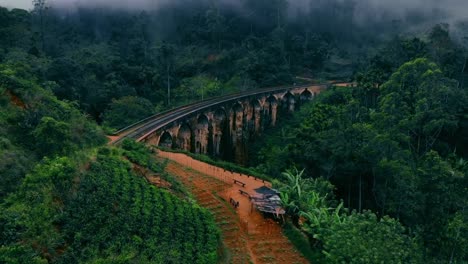 areal view of early mist morning at ella nine arch bridge ,sri lanka