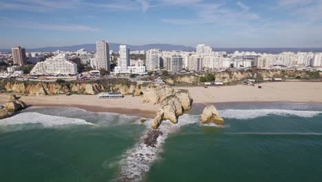 idyllic portimão's praia da rocha beachfront, algarve - aerial view