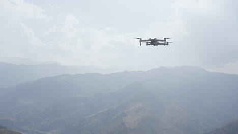 drone flying over mountains