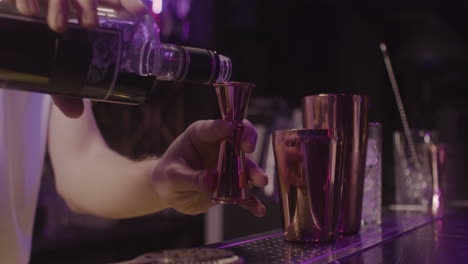 Close-Up-Of-A-Unrecognizable-Bartender-Preparing-Cocktail-Using-Cocktail-Shaker