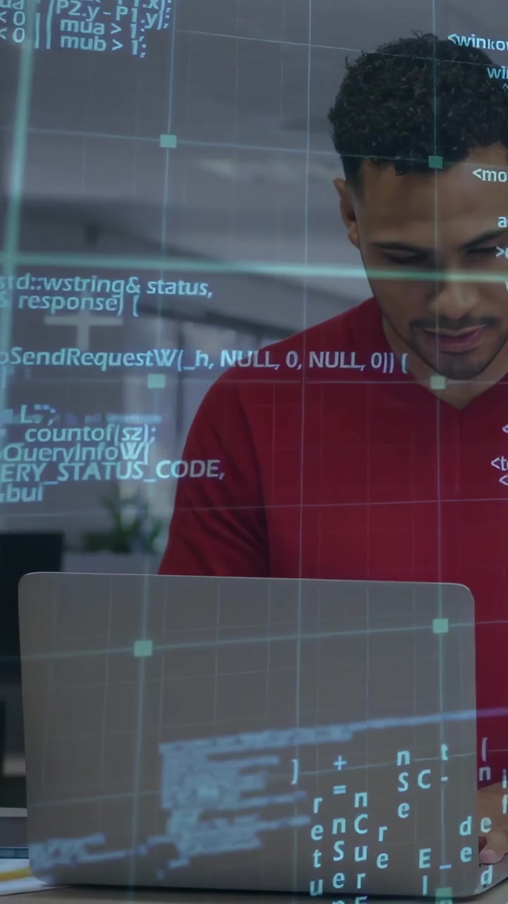 Vertical video: Dev typing, causing HUD code overlay across laptop, torso for software debugging