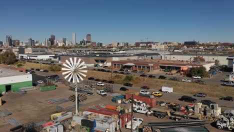 a commercial windmill is captured in this city scene