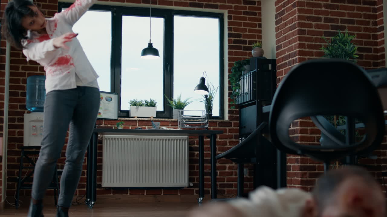 Panicked victim in office running away from scary undead monsters