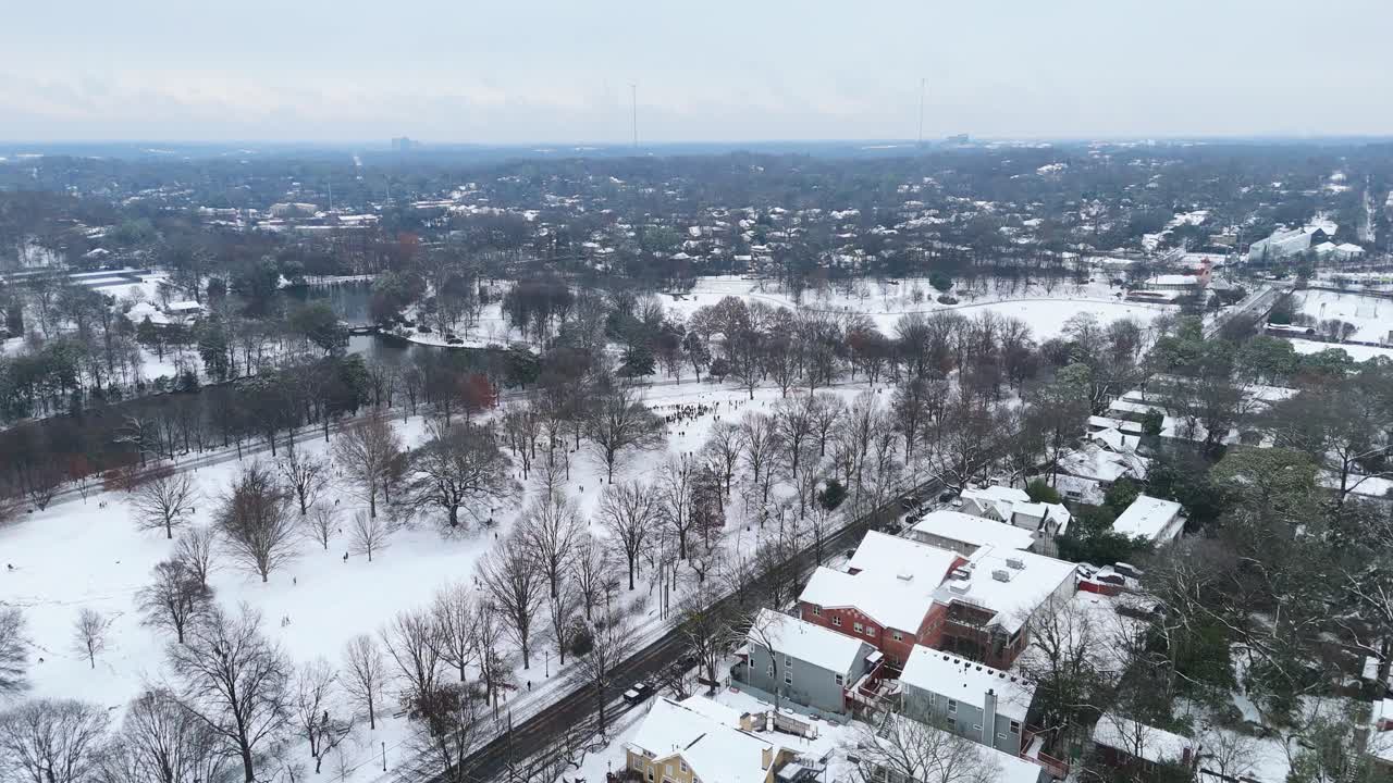 Aerial shot of snow covered Piedmont park in Atlanta on January 10th 2025.