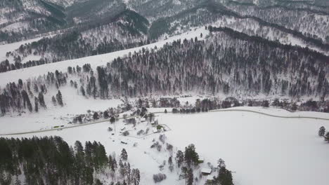 forestry mountains and steep slopes covered with white snow