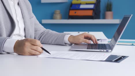 businessman signs with ballpoint pen on a white paper. business papers.