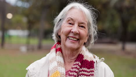 portrait, senior woman and smile in the park