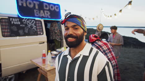 Portrait-of-Joyous-Middle-Eastern-Man-on-Summer-Festival