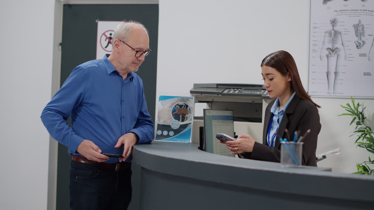 Patient paying at reception