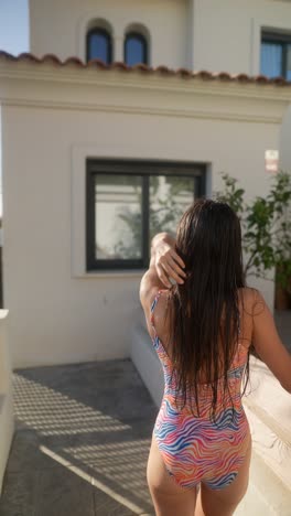 woman in a swimsuit relaxing outdoors