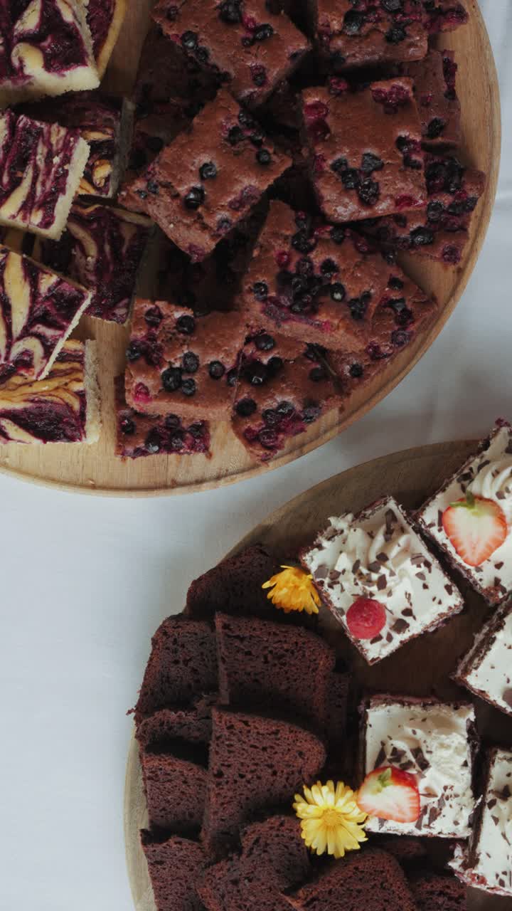 Vegan food and desserts on display in a vertical shot