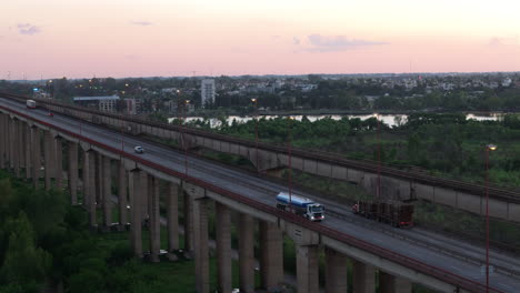 zárate-brazo largo railway bridge and cable-stayed road stretching over the paraná river, brazo largo, buenos aires, argentina.