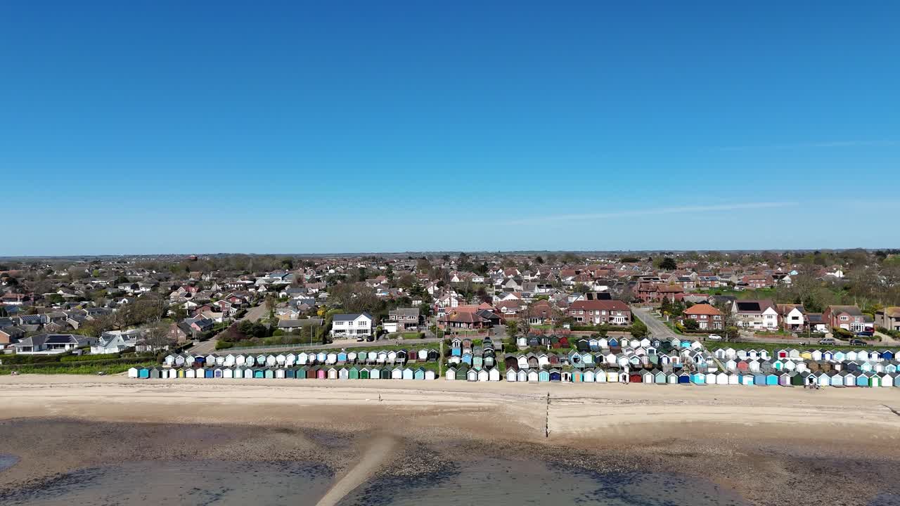 Beach Huts West Mersea Essex UK drone,aerial blue sky